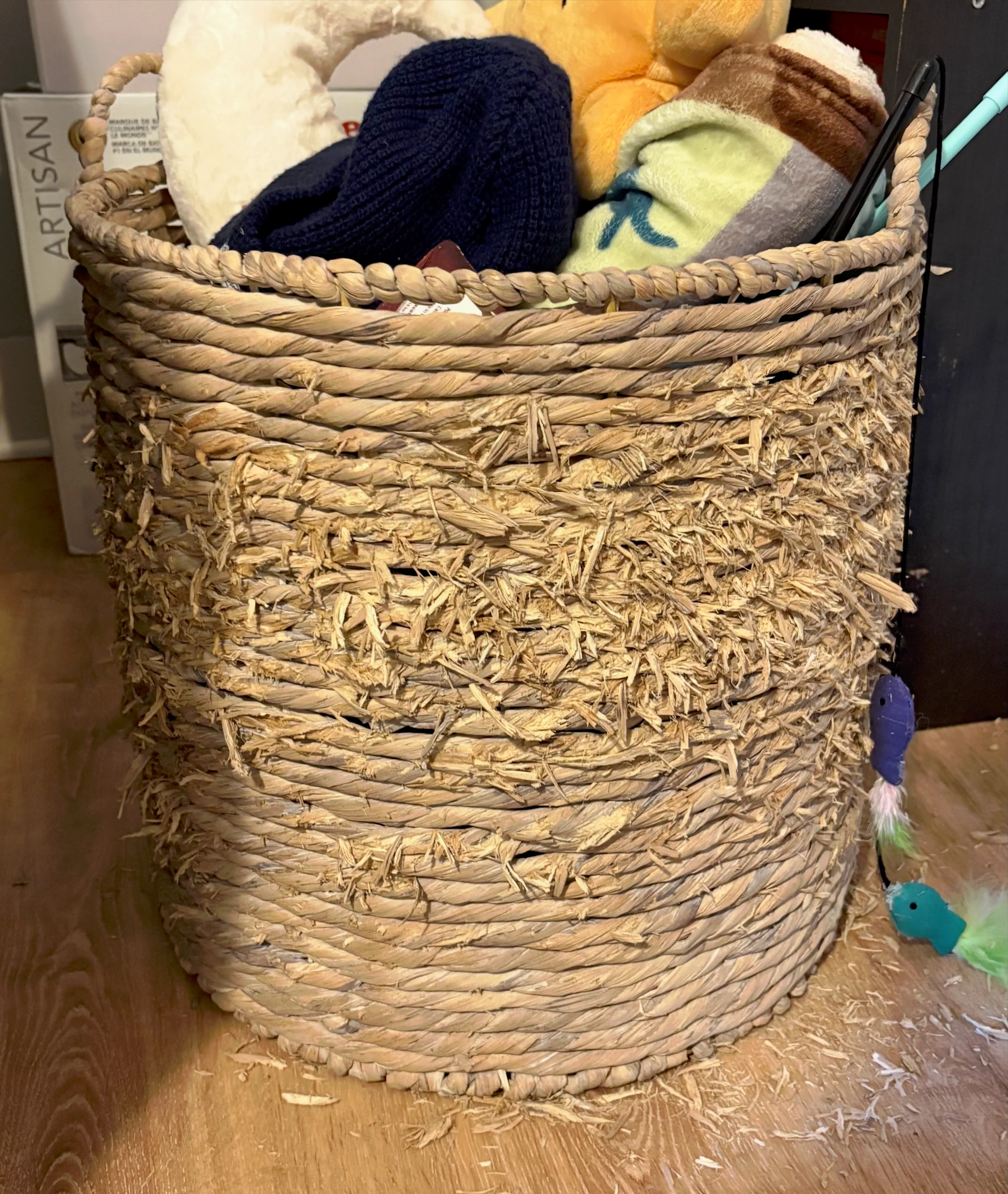 A basket ripped by cat